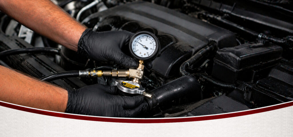 cooling system pressure test header